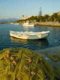 Fishing Nets on the Dock and Boats in the Port of Navplion