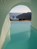 A Swimming Pool under an Arch Overlooking the Aegean Sea