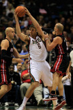 Miami Heat v Milwaukee Bucks: Andrew Bogut  Zydrunas Ilgauskas and Carlos Arroyo