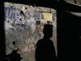 A Man's Silhouette Against a Wall
