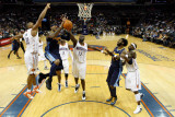 Denver Nuggets v Charlotte Bobcats: Carmelo Anthony  Boris Diaw and Nazr Mohammed