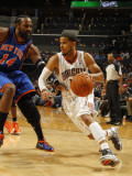 New York Knicks v Charlotte Bobcats: DJ Augustin and Ronny Turiaf