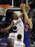 New York Knicks v Charlotte Bobcats: Timofey Mozgov and Dominic McGuire