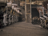 Workers at a Steel Mill