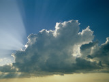 Rays of Sunlight Peek Out from Behind a Cloud