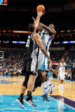 San Antonio Spurs v New Orleans Hornets: Emeka Okafor and Tim Duncan