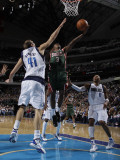 Milwaukee Bucks v Dallas Mavericks: Brandon Jennings and Dirk Nowitzki