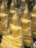 Buddha Statues Wrapped in Plastic