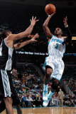 San Antonio Spurs v New Orleans Hornets: Chris Paul and Tim Duncan