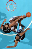 San Antonio Spurs v New Orleans Hornets: Emeka Okafor and Tim Duncan