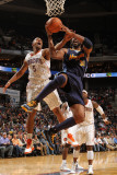 Denver Nuggets v Charlotte Bobcats: Dominic McGuire and Nene