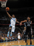 San Antonio Spurs v New Orleans Hornets: Marcus Thornton and Tim Duncan