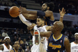 Denver Nuggets v Charlotte Bobcats: Nene  Chauncey Billups and DJ Augustin