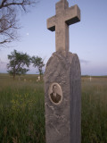 Grave Markers Stand Out in Early Morning at a Cemetery