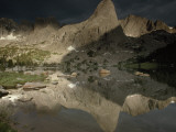 Lonesome Lake Mirrors the Play of Light and Shadow on Pingora Peak  in the Cirque of the Towers