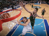 Milwaukee Bucks v Dallas Mavericks: Dirk Nowitzki and Andrew Bogut