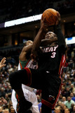 Miami Heat v Milwaukee Bucks: Dwyane Wade and John Salmons