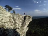 A Solitary Hiker Looks over the Blue Ridge Mountains from Hanging Rock  North Carolina