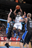 Orlando Magic v Denver Nuggets: Ty Lawson and Jason Williams