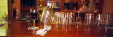 Wine Glass and Money on Bar