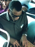 Ray Charles Playing Chess on the Tour Bus