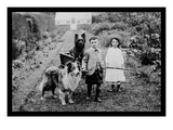 Boy and Girls with Two Dogs and a Wagon
