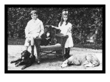 Boy and Girl with Their Four Dogs