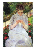Young Woman Sewing In The Garden