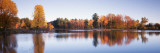 Trees in Autumn along a Lake  Canterbury  New Hampshire  England