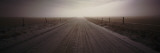 Empty Road Passing through a Landscape  Helena  Montana  USA