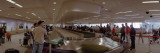 People Standing near Conveyor Belt  St Paul International Airport  Minneapolis  Minnesota  USA