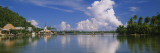 Reflection of Buildings and Trees on Water  Huahine  French Polynesia