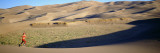 Woman Running in the Desert  Great Sand Dunes National Monument  Colorado  USA
