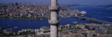 Minaret with Bridge Across the Bosphorus in the Background  Istanbul  Turkey