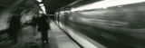 Subway Train Passing through a Subway Station  London  England