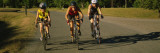 Three Adult Women Cycling