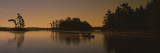 Silhouette of a Person in a Canoe on a Lake  Kejimkujik Lake  Nova Scotia  Canada