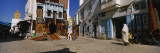 Four People Walking on the Street  Medina  Kairwan  Tunisia