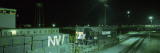 Cargo Containers and a Train Engine in a Shunting Yard