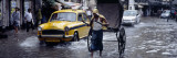 Cars and a Rickshaw on the Street  Calcutta  West Bengal  India