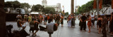 Three People Playing Musical Instruments at a Town Square  Barcelona  Catalonia  Spain