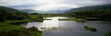 Sunlight on Water  Distant Mountains in Mist  Ireland