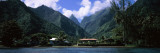 Mountains and Buildings on the Coast  Tahiti  French Polynesia