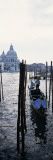 Gondolier in Gondola with Cathedral in Background  Santa Maria Della Salute  Venice  Veneto  Italy