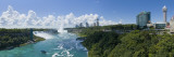 Waterfall in River with New York Skyline in Background  Niagara Falls  Ontario  Canada