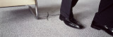 Man's Leg Tied to a Chair with Shoelace