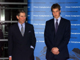Britain's Prince Charles with his eldest son Prince William as they arrive at a function at London'