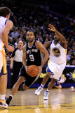 San Antonio Spurs v Golden State Warriors  Oakland  CA - January 24: Tony Parker and Reggie William