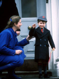 Prince William being met on his first day of school by headmistress Miss Frederika
