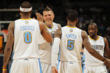 Charlotte Bobcats v Denver Nuggets  Denver  CO - March 02: Gary Forbes  Chris Andersen  JR Smith 
